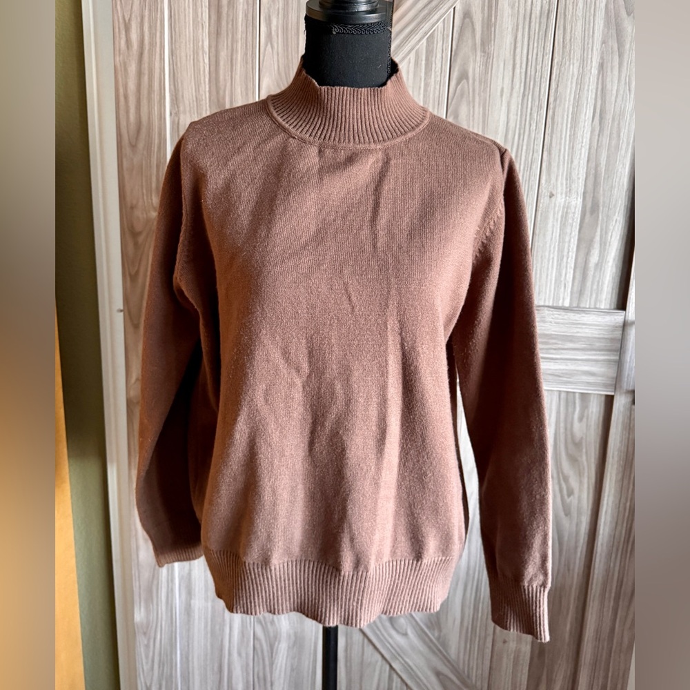 Women's cozy brown turtleneck sweater. Long sleeves